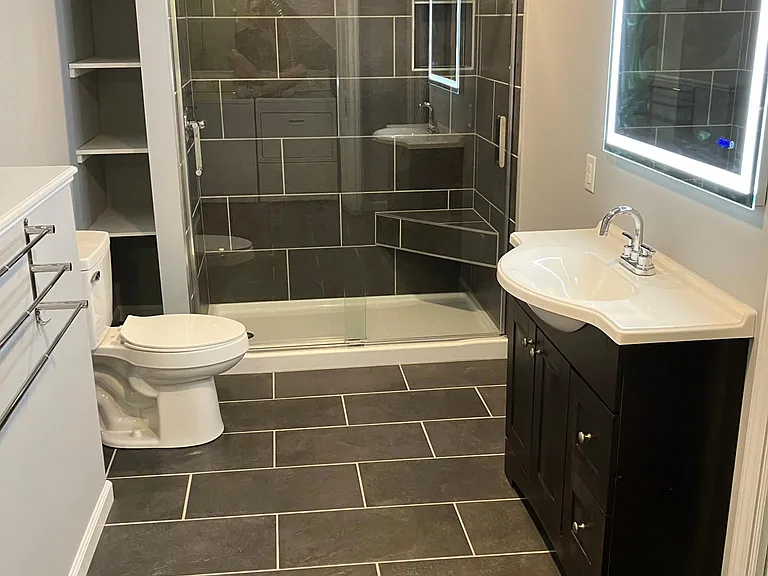 Downstairs full bath (view 1)