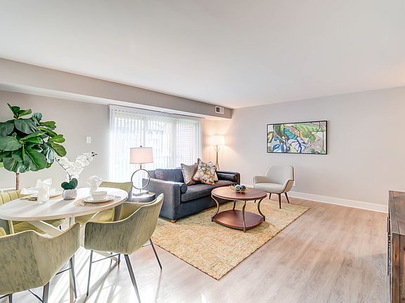 Newly Renovated Living/Dining Areas With Wood-Style Flooring
