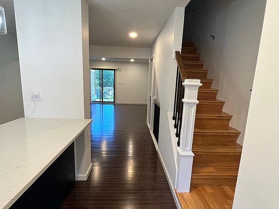 from the front door entrance Quartz countertops with large island