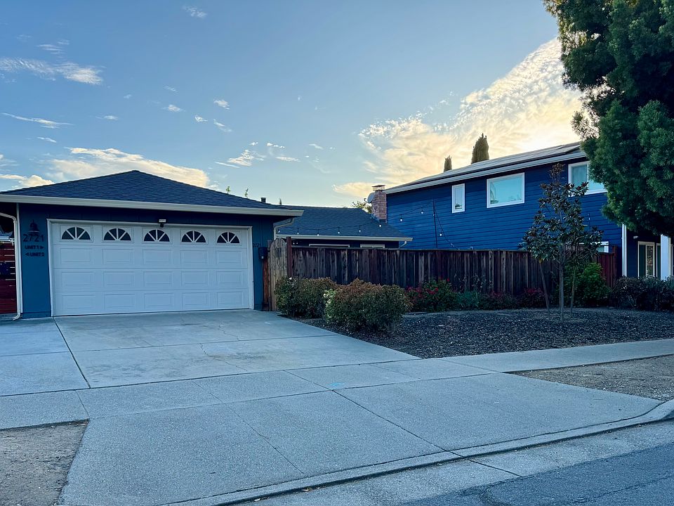 Front Facade. Two Car Garage with Additional Driveway Parking