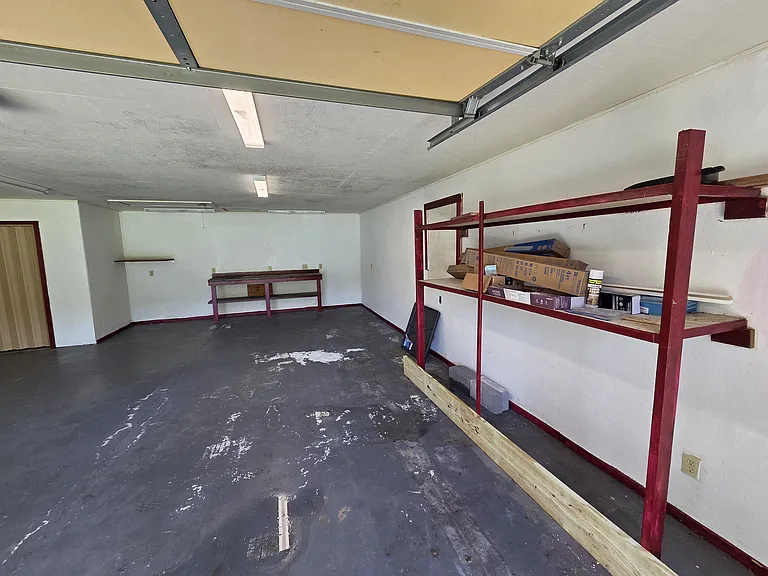 2 car garage with shelves