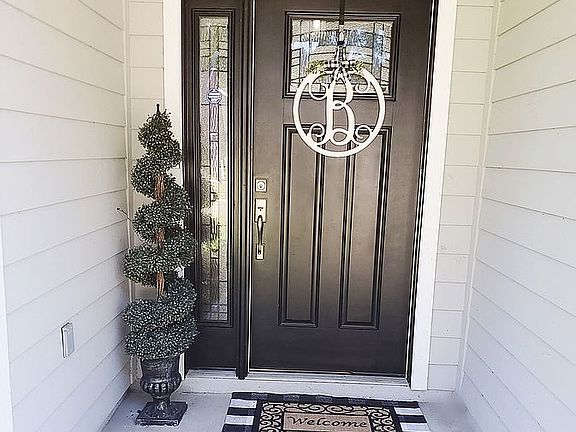 RING doorbell behind tree
