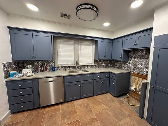 New paint, granite counters, backsplash, appliances and tile in kitchen