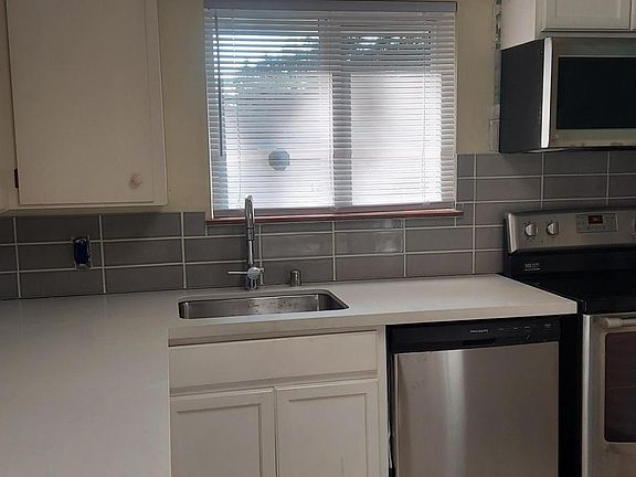 new quartz counter top new dishwasher and microwave