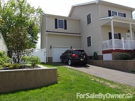 Front of Home
						:
						Professionally landscaped and maintained