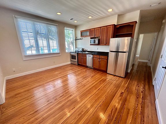 Front door leading into Kitchen, Dining/Living Room