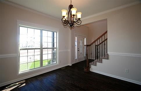 Gracious Formal Dining Room with Decorative Trim Details