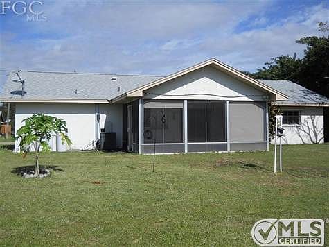 ADDITIONAL VIEW OF THE REAR OF THE HOME AND LANAI