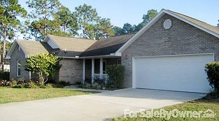 Welcome to 906 20th St.
						:
						All brick home with white vinyl trim and 2 car garage