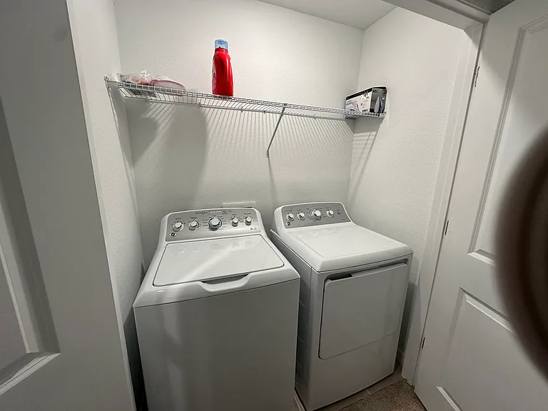 New washer and dryer in upstair hallway