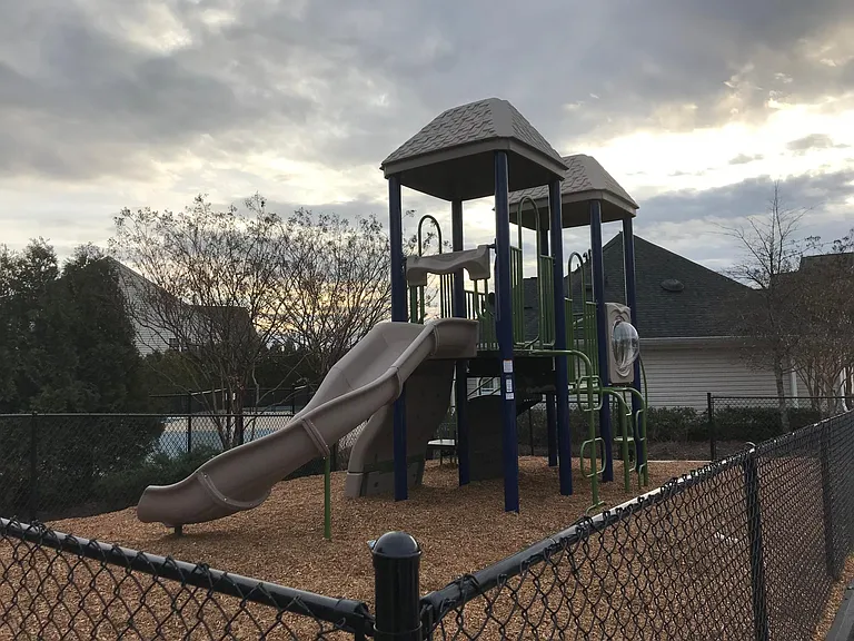 Community playground next to the community pool