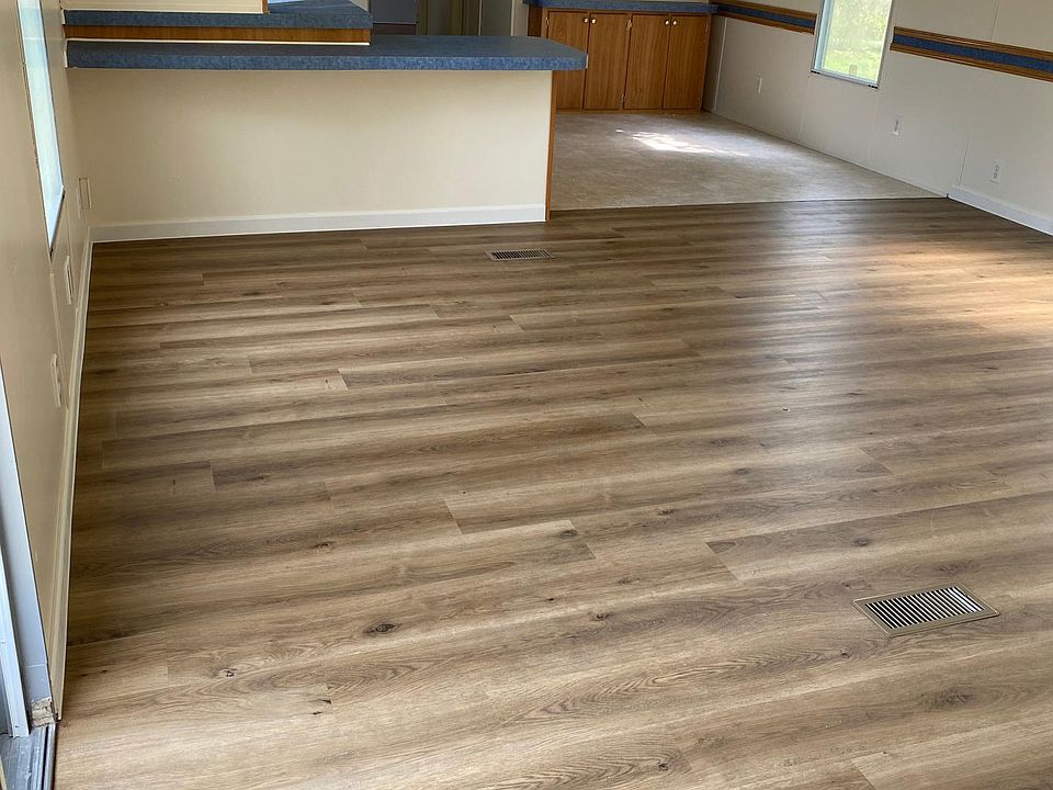 New Floors in Living Room and Hallway. Hallway not shown in picture.