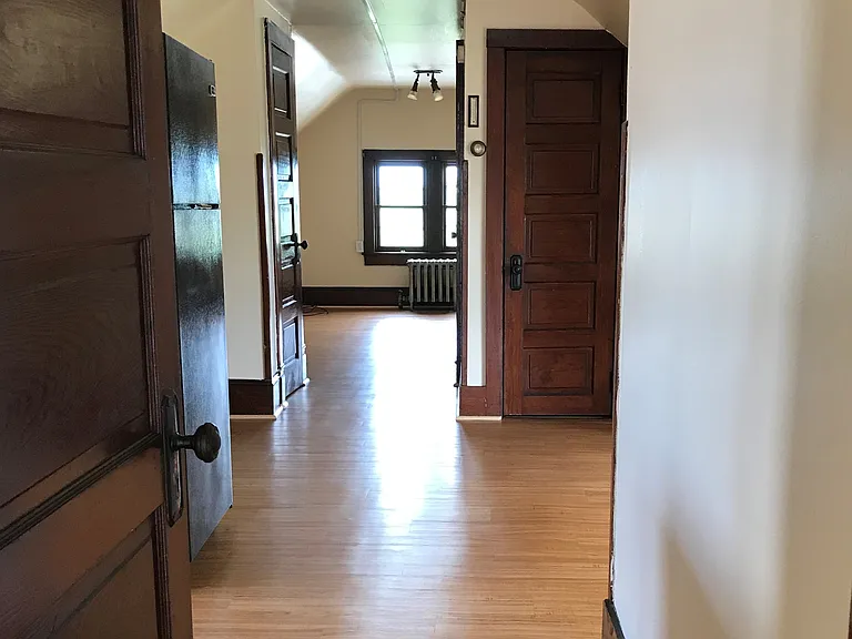 View from Bedroom through Dining/Kitchen to Living Room