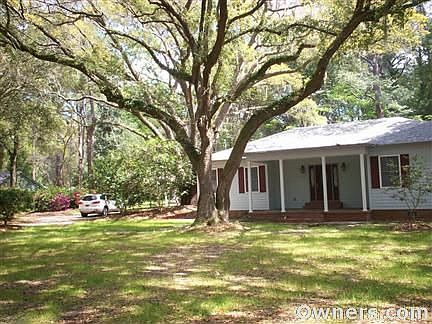 Approx 1 acre--beautiful trees & shrubs