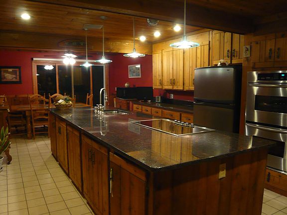 4x12 island with Viking cooktop, double oven