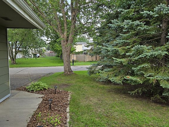 Nice wooded privacy with mature evergreens.
