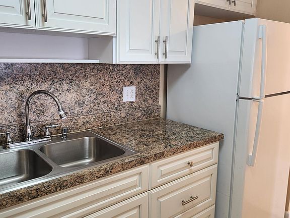 Kitchen sink and refrigerator