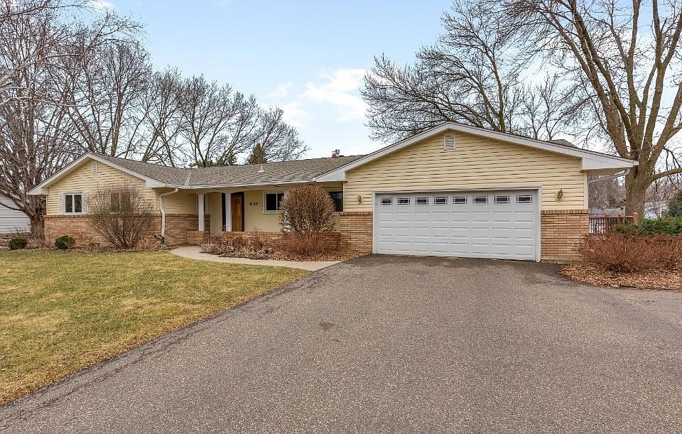 Spectacular walkout rambler set on a mature 0.5-acre lot. Insulated garage and spacious front porch.