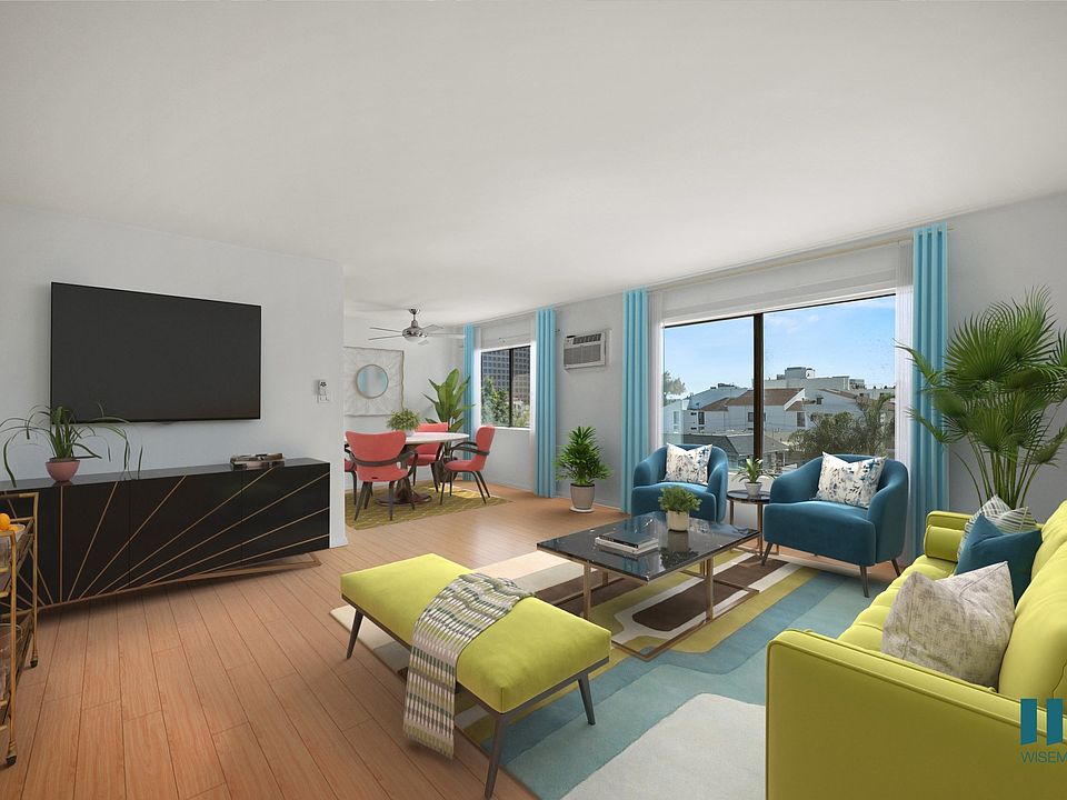 Spacious Living Room with Large-Size Windwos Providing Lots of Natural Light