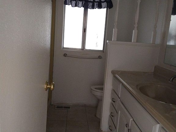 2nd Bath room with double sinks and bath tub