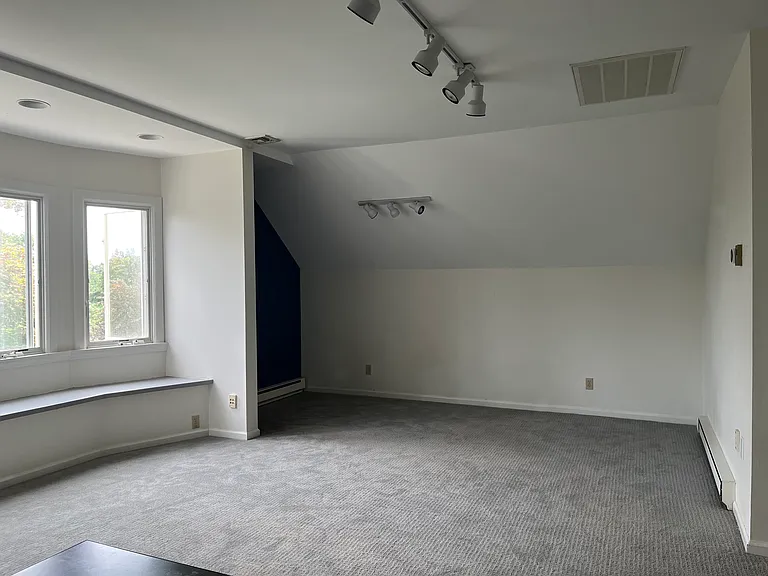 Spacious 'nook' next to bay windows