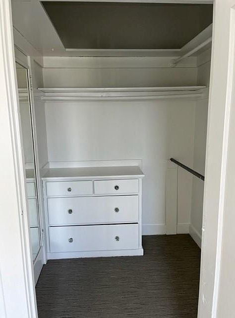 Walk-in Closet with Build-in chester drawers