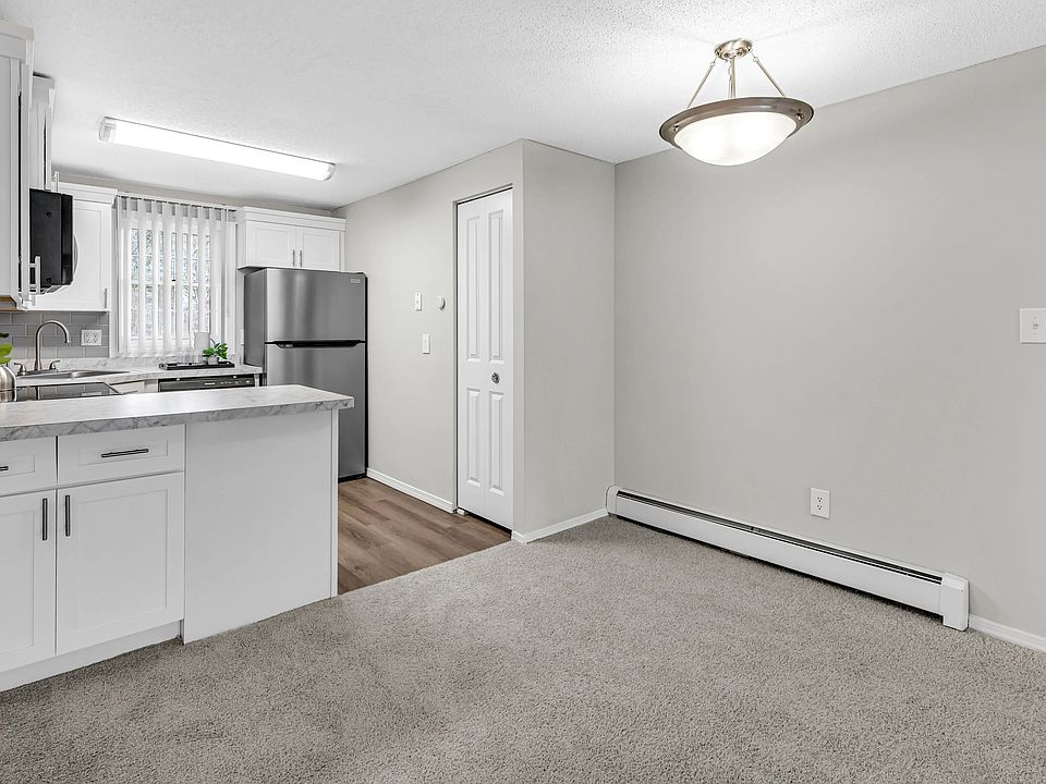 Savor meals in the separate dining area, uniting the living and kitchen spaces.