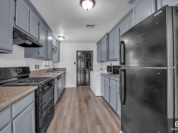 3rd image of 10203 S Denker Ave
