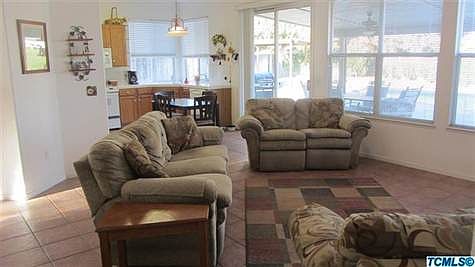 Kitchen open to the family room with Fireplace.