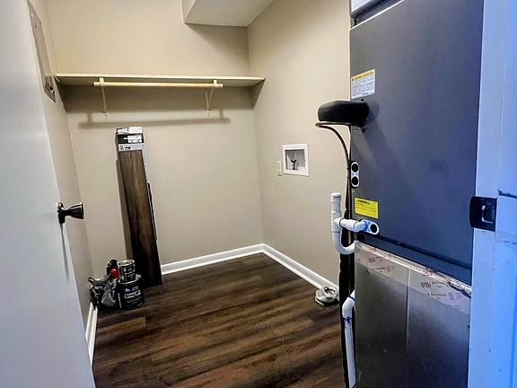 Large walk in laundry room with W/D hook ups