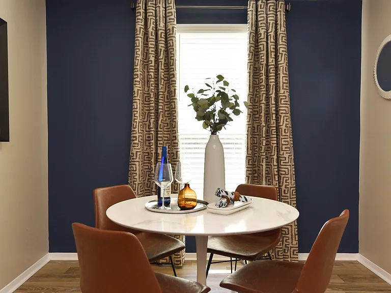Dining area with hardwood-style flooring