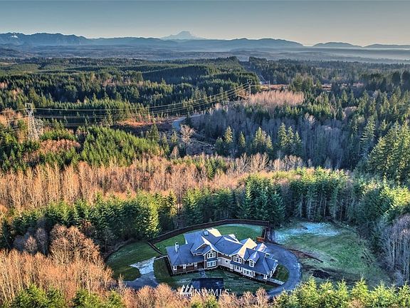 A peaceful oasis awaits in this private 26+ acres homesite. 