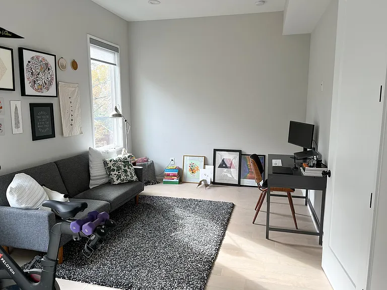 First master bedroom - currently being used as an office. Will easily fit a large bed