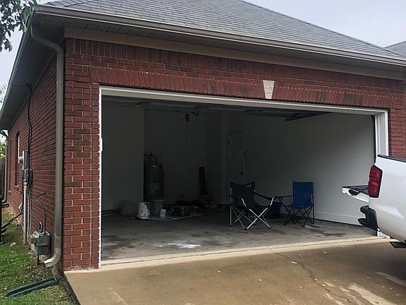 Nice two car garage with remote door openers.