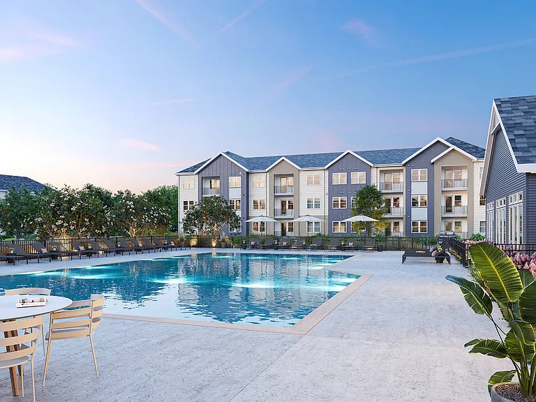 Resort-Style Swimming Pool and Sun Deck at Archer Eastfield Station Apartments