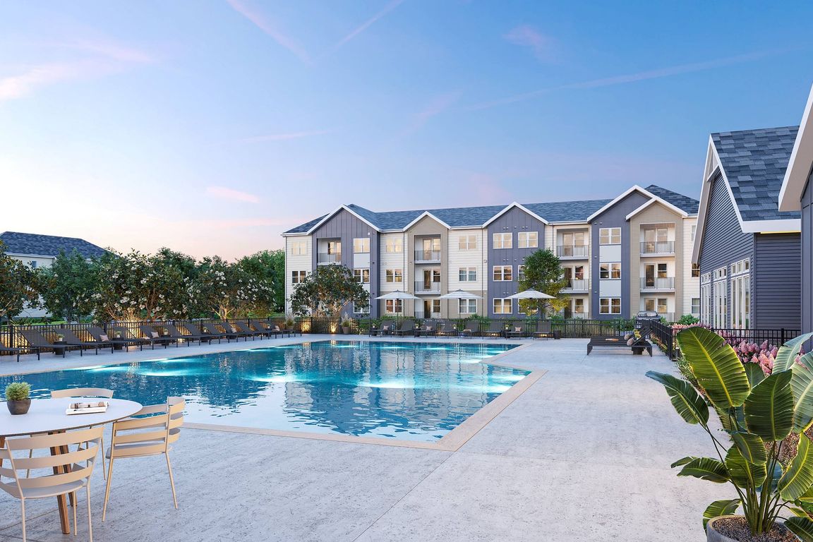 Resort-Style Swimming Pool and Sun Deck at Archer Eastfield Station Apartments