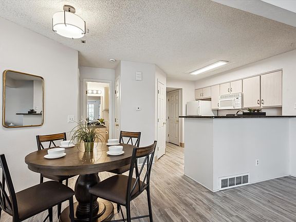 Eating area looking into kitchen