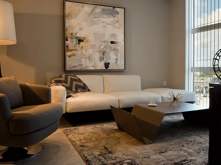 Oversized windows and tall ceilings offer a spacious feel