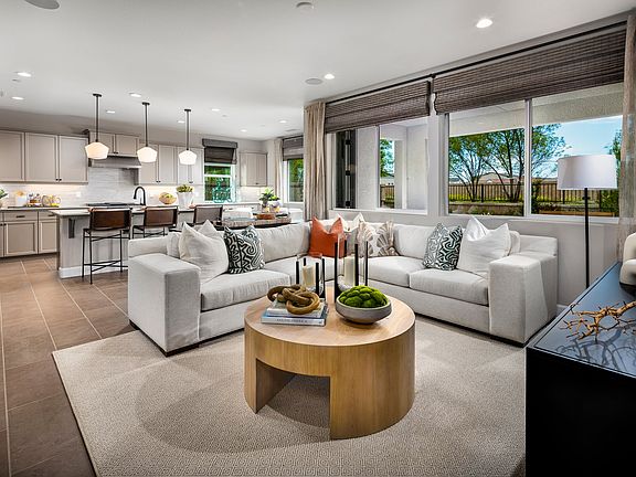 The inviting Great Room can be found at the heart of the home, designed for seamless entertaining an