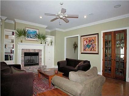 The large living room has French doors leading to the dining room
