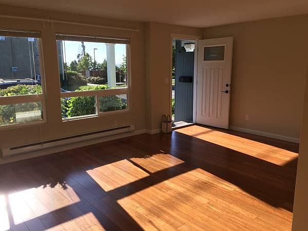 Living room looks out on Edmonds Center for the Arts (identical unit pictured).