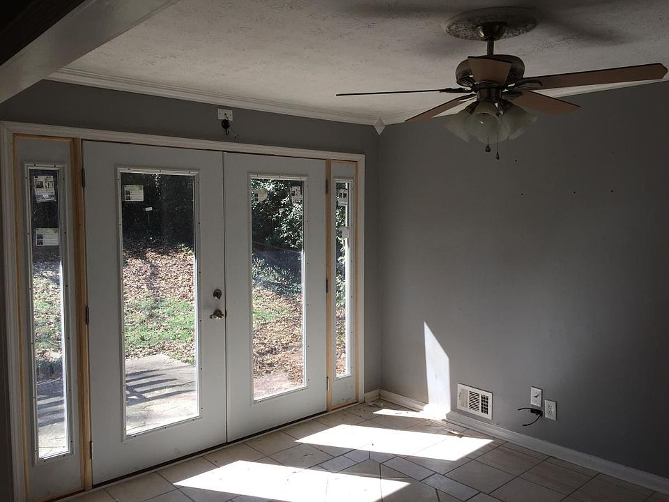 Den with new double French doors