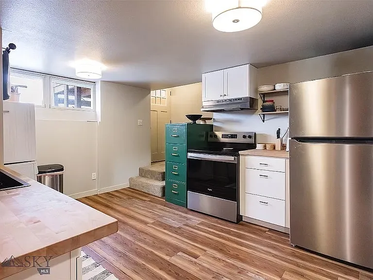 Kitchen with full sized refrigerator
