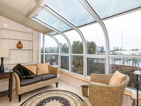 Sunroom, overlooking water and dock