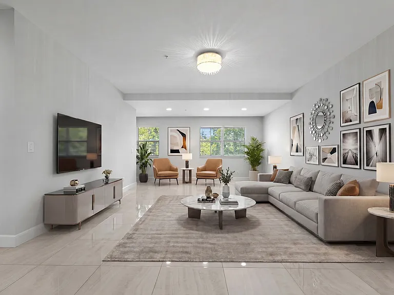 Staged to showcase the open living area _ an ideal, gallery-like setting perfect for displaying art and entertaining in refined style.