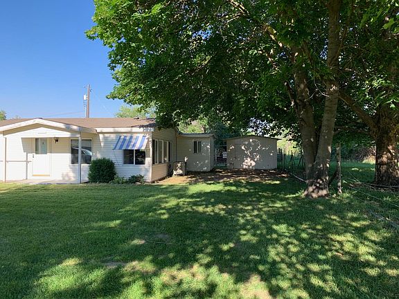 FRONT OF HOME WITH SHED