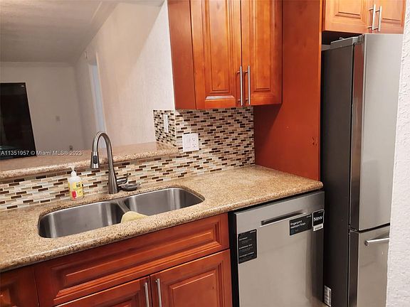 2nd image of 860 NE 209th Ter APT 202-33