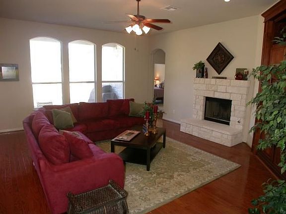 great family room with built-in and gas fireplace