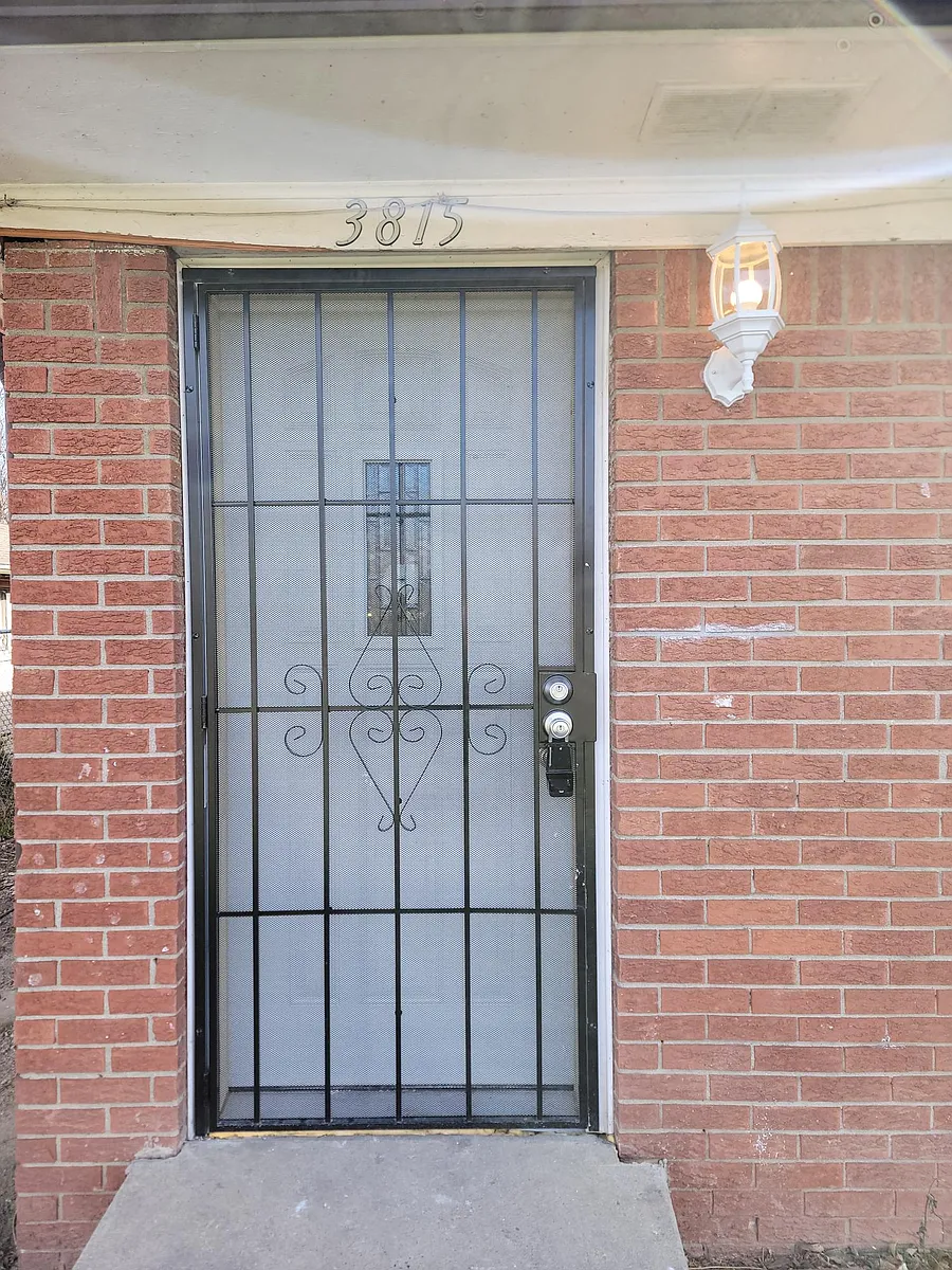 Private front entrance with security Storm door! - 3815 N Grand Ave #3815