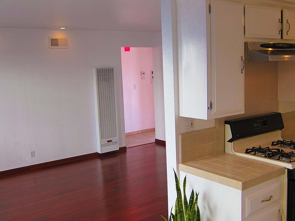 From Dining Area across Living Room to Hallway